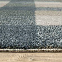 3' X 5' Teal Grey Tan And Beige Geometric Power Loom Stain Resistant Area Rug