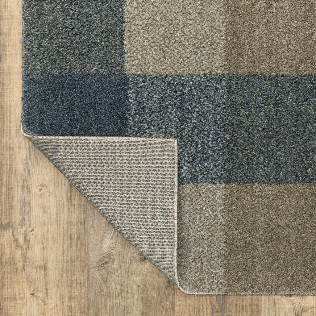 6' X 9' Teal Grey Tan And Beige Geometric Power Loom Stain Resistant Area Rug