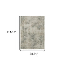 6' X 9' Grey Beige And Teal Oriental Power Loom Stain Resistant Area Rug