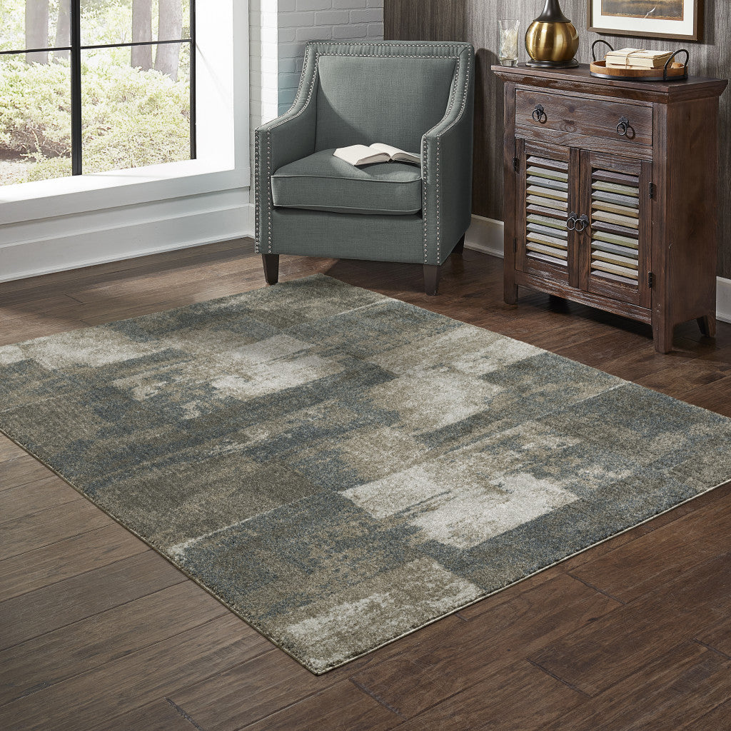 5' X 8' Teal Blue Grey Tan And Beige Geometric Power Loom Stain Resistant Area Rug