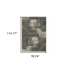 6' X 9' Teal Blue Grey Tan And Beige Geometric Power Loom Stain Resistant Area Rug