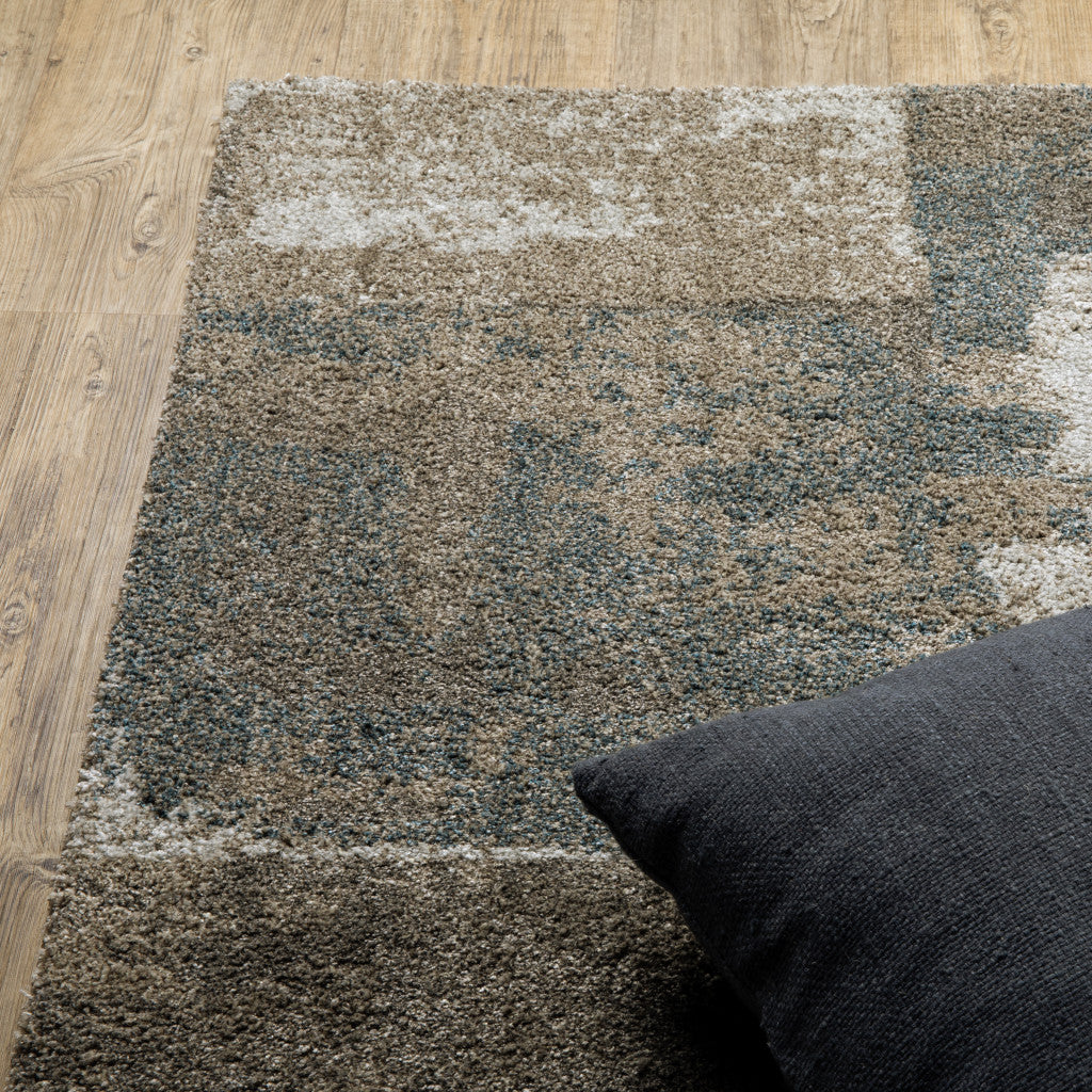 10' X 13' Teal Blue Grey Tan And Beige Geometric Power Loom Stain Resistant Area Rug