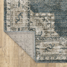 6' X 9' Blue And Beige Oriental Power Loom Stain Resistant Area Rug
