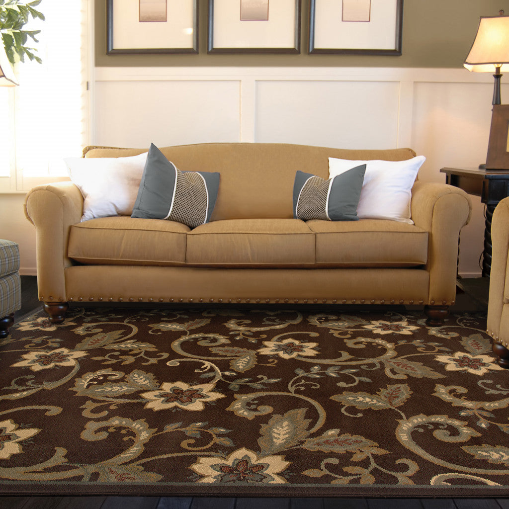 10' X 13' Brown Ivory Blue Rust Gold And Green Floral Power Loom Stain Resistant Area Rug