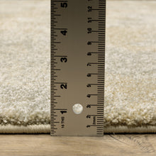 2' X 8' Grey Ivory Beige And Taupe Abstract Power Loom Stain Resistant Runner Rug