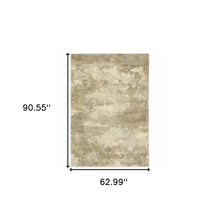 5' X 8' Beige Grey Tan And Gold Abstract Power Loom Stain Resistant Area Rug