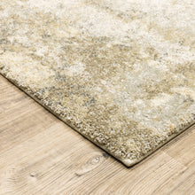 8' X 11' Beige Grey Tan And Gold Abstract Power Loom Stain Resistant Area Rug