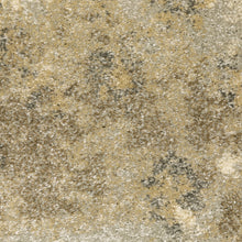 8' X 11' Beige Grey Tan And Gold Abstract Power Loom Stain Resistant Area Rug