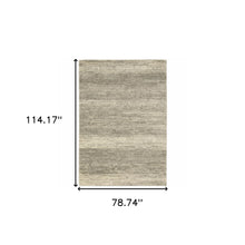 6' X 9' Grey Beige And Tan Abstract Power Loom Stain Resistant Area Rug