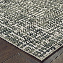 10' X 13' Grey And Ivory Abstract Power Loom Stain Resistant Area Rug