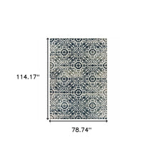 6' X 9' Navy And Ivory Geometric Power Loom Stain Resistant Area Rug