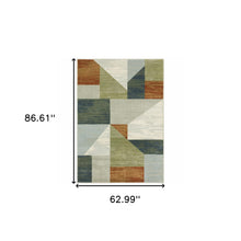 5' X 7' Grey Teal Blue Rust Green And Ivory Geometric Power Loom Stain Resistant Area Rug