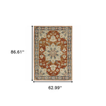 5' X 7' Rust Beige Teal Blue And Gold Oriental Power Loom Stain Resistant Area Rug