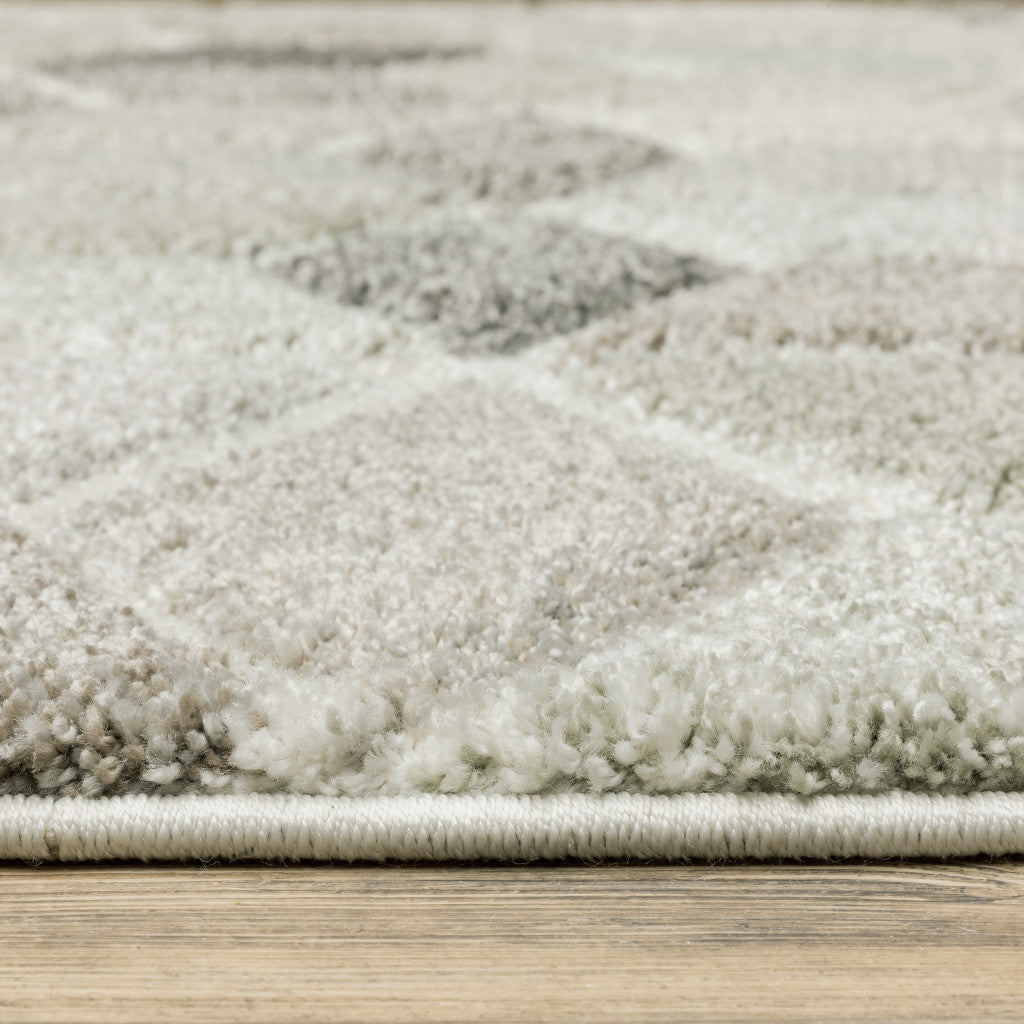 8' X 11' Beige Brown Grey Tan Sage And Pale Blue Geometric Power Loom Stain Resistant Area Rug