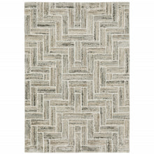 6' X 9' Ivory Beige Grey Brown Pale Blue And Charcoal Geometric Power Loom Stain Resistant Area Rug