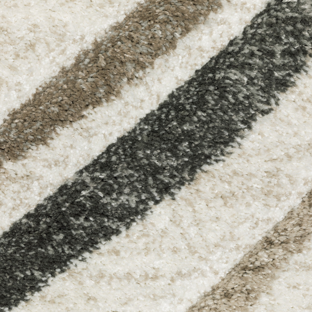 8' X 11' Beige Grey Brown Sage Pale Blue Tan And Charcoal Abstract Power Loom Stain Resistant Area Rug