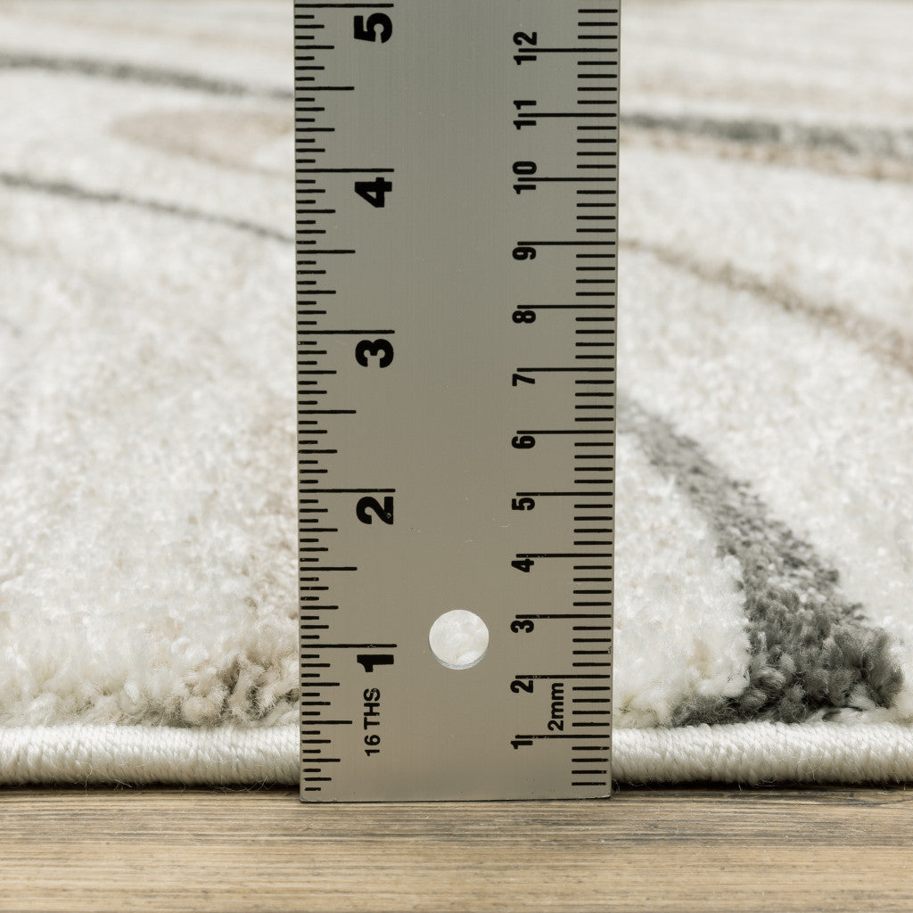 8' X 11' Beige Grey Brown Sage Pale Blue Tan And Charcoal Abstract Power Loom Stain Resistant Area Rug