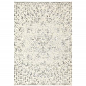 8' X 11' Ivory And Grey Floral Power Loom Stain Resistant Area Rug