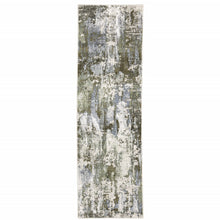 2' X 8' Green Blue Grey Ivory And Brown Abstract Power Loom Stain Resistant Runner Rug