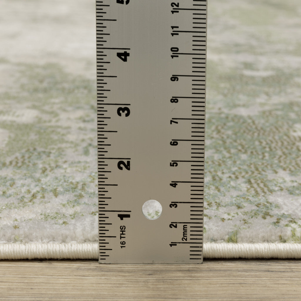 6' X 9' Beige Grey Brown And Sage Green Abstract Power Loom Stain Resistant Area Rug