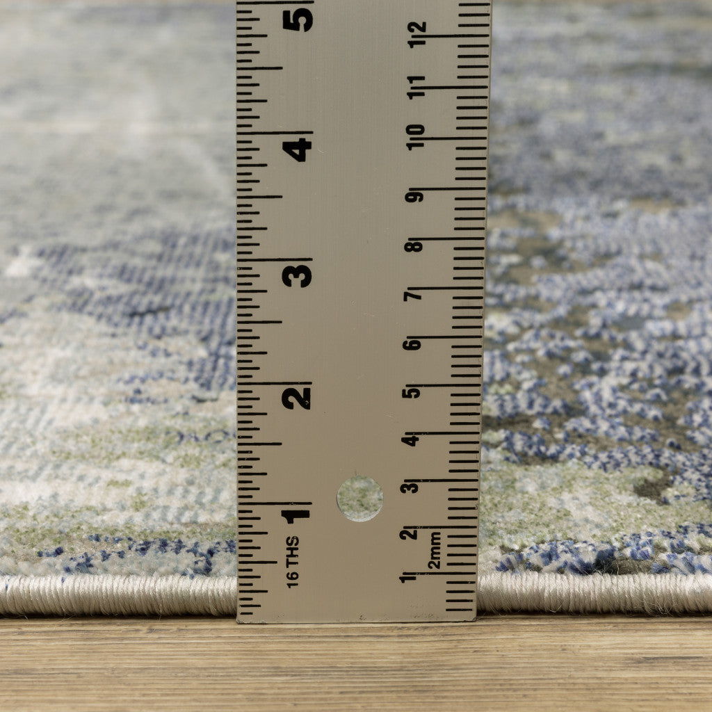 5' X 8' Blue Green Grey And Beige Abstract Power Loom Stain Resistant Area Rug