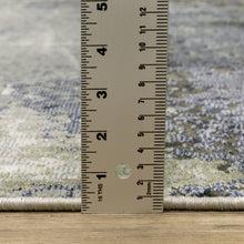 5' X 8' Blue Green Grey And Beige Abstract Power Loom Stain Resistant Area Rug