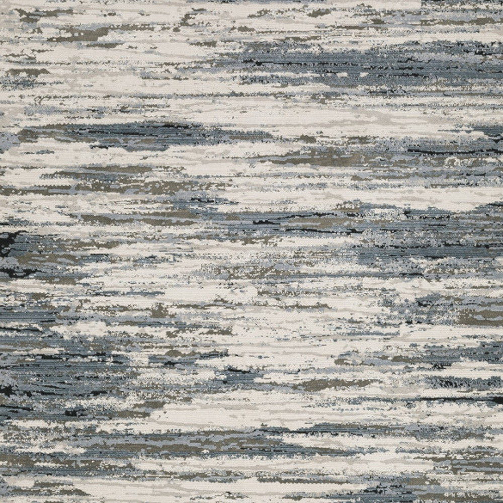 6' X 9' Blue Grey Beige And Brown Abstract Power Loom Stain Resistant Area Rug