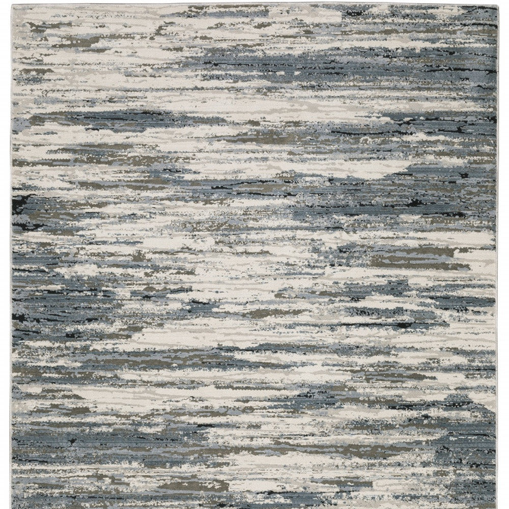 6' X 9' Blue Grey Beige And Brown Abstract Power Loom Stain Resistant Area Rug
