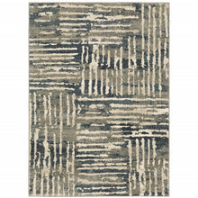 6' X 9' Blue And Beige Abstract Power Loom Stain Resistant Area Rug
