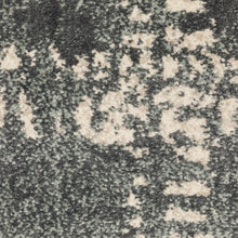 5' X 7' Blue And Ivory Geometric Power Loom Stain Resistant Area Rug