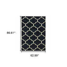 5' X 7' Navy And Ivory Geometric Power Loom Stain Resistant Area Rug