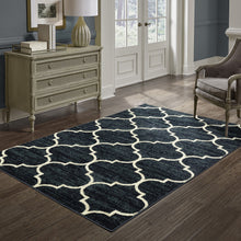 5' X 7' Navy And Ivory Geometric Power Loom Stain Resistant Area Rug