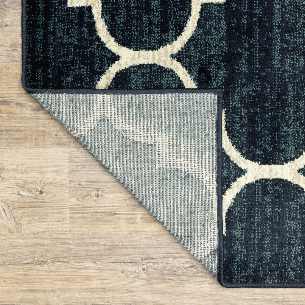 5' X 7' Navy And Ivory Geometric Power Loom Stain Resistant Area Rug