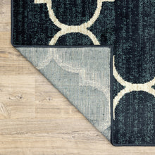 5' X 7' Navy And Ivory Geometric Power Loom Stain Resistant Area Rug