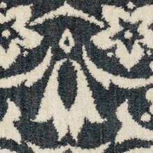 8' X 10' Blue And Ivory Floral Power Loom Stain Resistant Area Rug