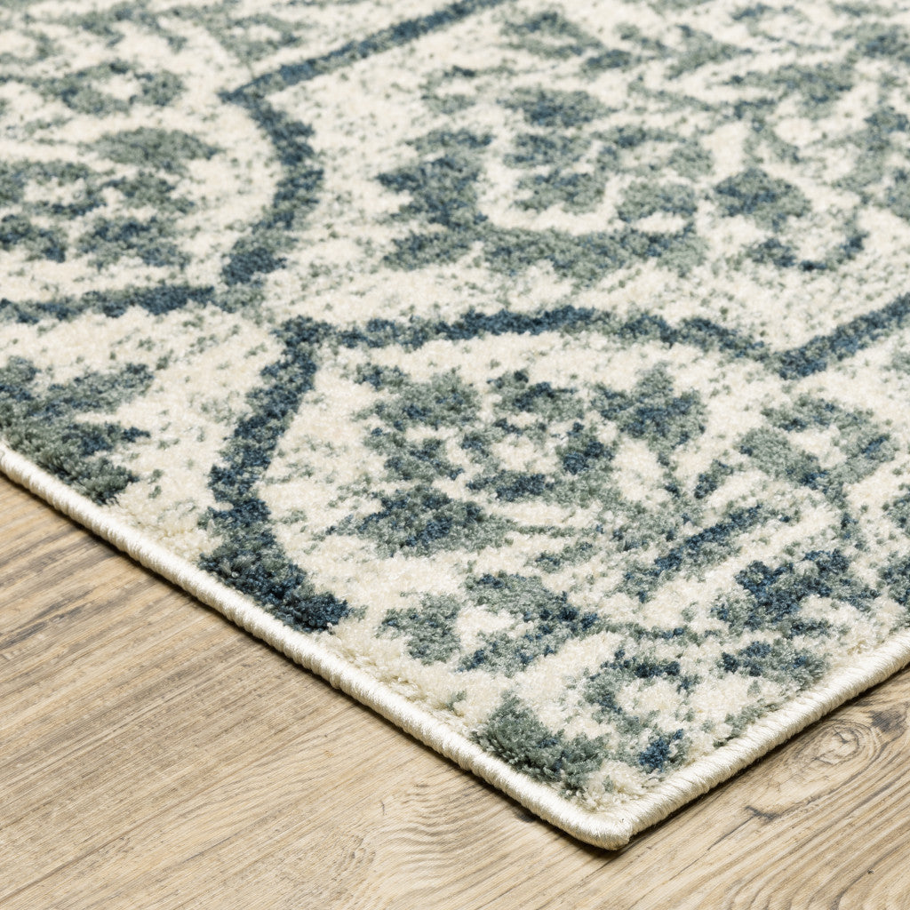8' X 10' Ivory Blue And Sage Floral Power Loom Stain Resistant Area Rug