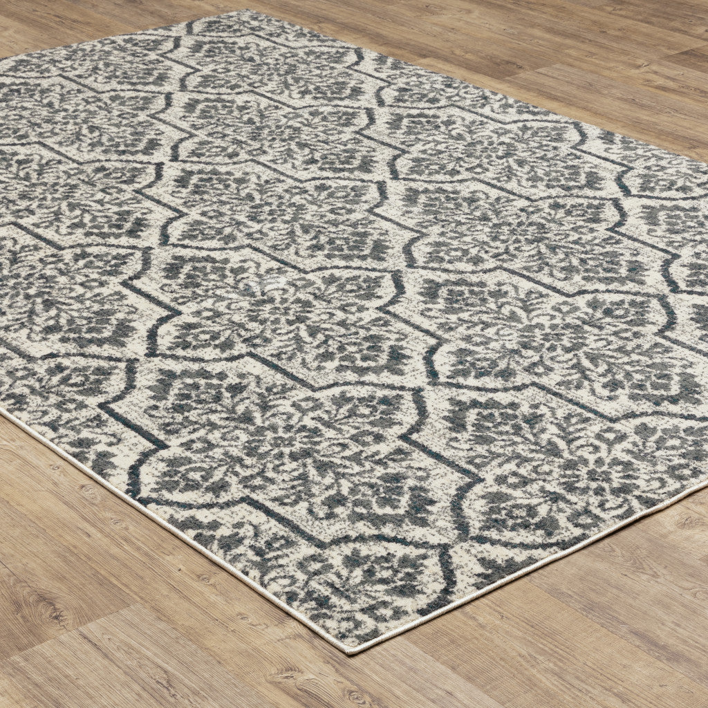 8' X 10' Ivory Blue And Sage Floral Power Loom Stain Resistant Area Rug