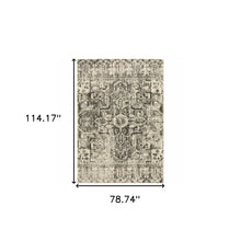 6' X 9' Grey Ivory And Brown Oriental Power Loom Stain Resistant Area Rug