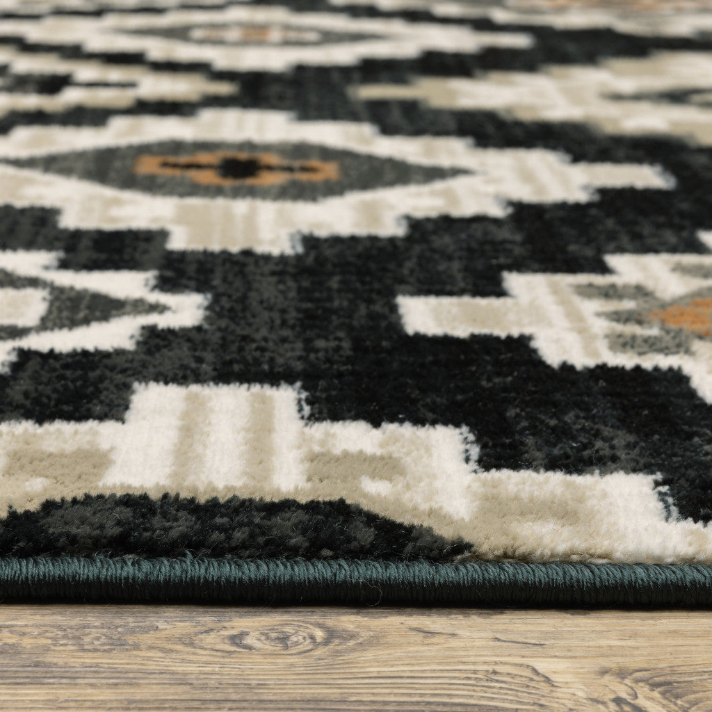 8' X 10' Black Grey Tan Orange And Ivory Southwestern Power Loom Stain Resistant Area Rug