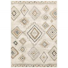 6' X 9' Ivory Orange Tan Black And Grey Southwestern Power Loom Stain Resistant Area Rug