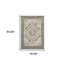 4' X 6' Ivory Grey Black And Ivory Oriental Power Loom Stain Resistant Area Rug