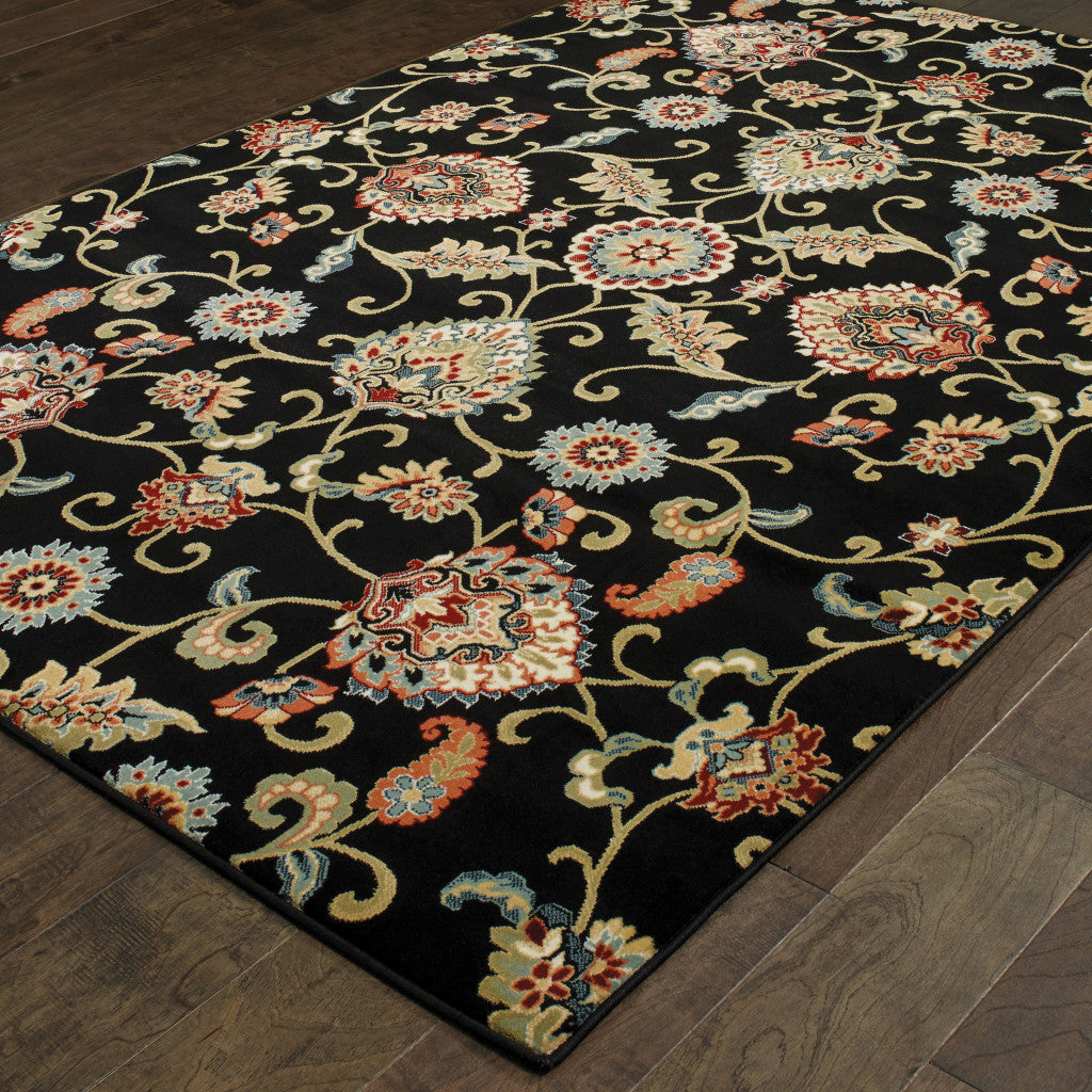 6' X 9' Black Red Green Ivory Salmon And Yellow Floral Power Loom Stain Resistant Area Rug