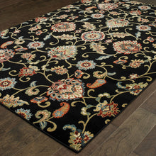 6' X 9' Black Red Green Ivory Salmon And Yellow Floral Power Loom Stain Resistant Area Rug