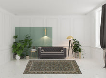 6' X 9' Navy Blue Green Red Ivory And Yellow Oriental Power Loom Stain Resistant Area Rug