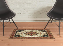 2' X 4' Red And Ivory Oriental Power Loom Stain Resistant Area Rug