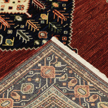 10' X 13' Red Blue Orange And Ivory Oriental Power Loom Stain Resistant Area Rug With Fringe