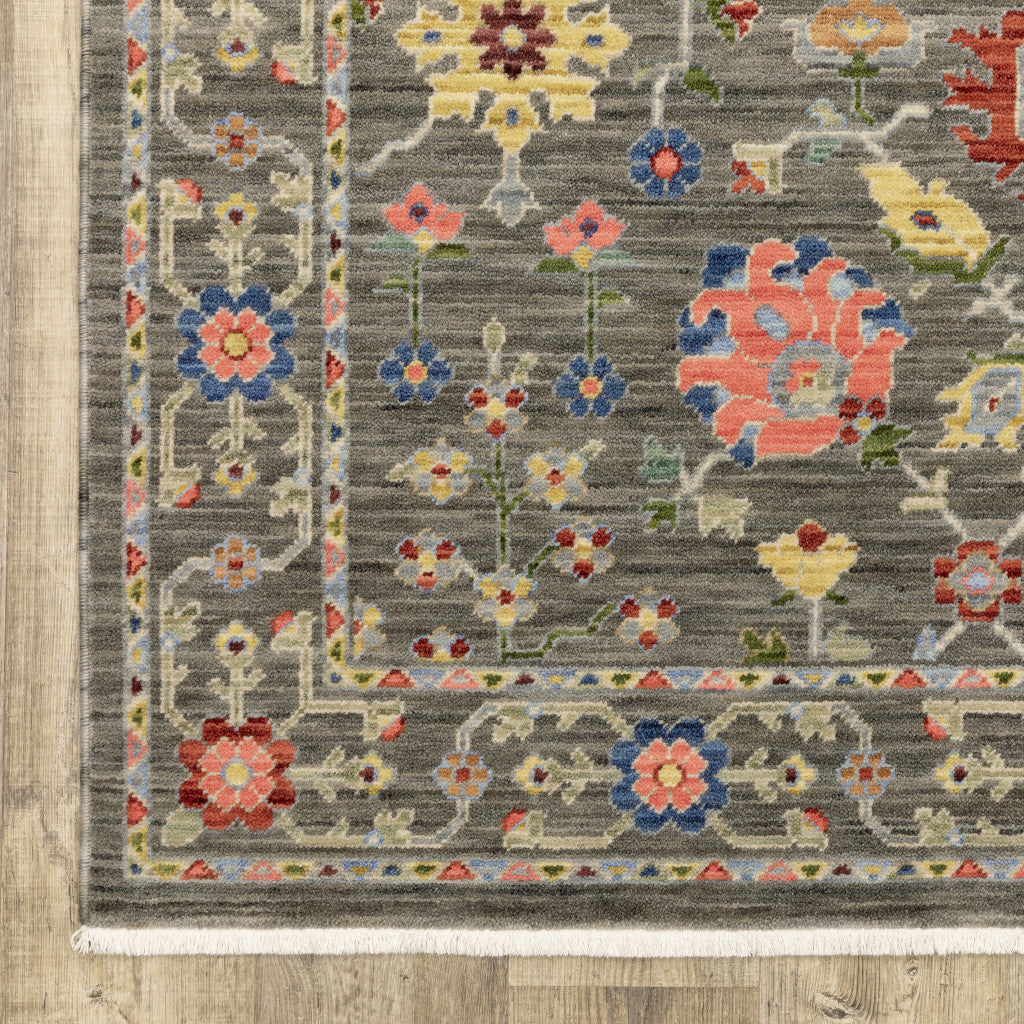 2' X 3' Grey Salmon Pink Gold Blue Rust Deep Blue Ivory And Green Oriental Power Loom Stain Resistant Area Rug With Fringe