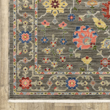 5' X 8' Grey Salmon Pink Gold Blue Rust Deep Blue Ivory And Green Oriental Power Loom Stain Resistant Area Rug With Fringe