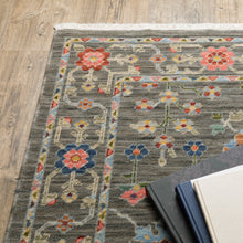 6' X 9' Grey Salmon Pink Gold Blue Rust Deep Blue Ivory And Green Oriental Power Loom Stain Resistant Area Rug With Fringe