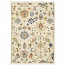 10' X 13' Ivory Beige Gold Grey Blue Pink Red Rust And Green Oriental Power Loom Stain Resistant Area Rug With Fringe